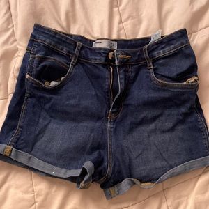 High waisted shorts. Dark denim. Nice stretch. Great length